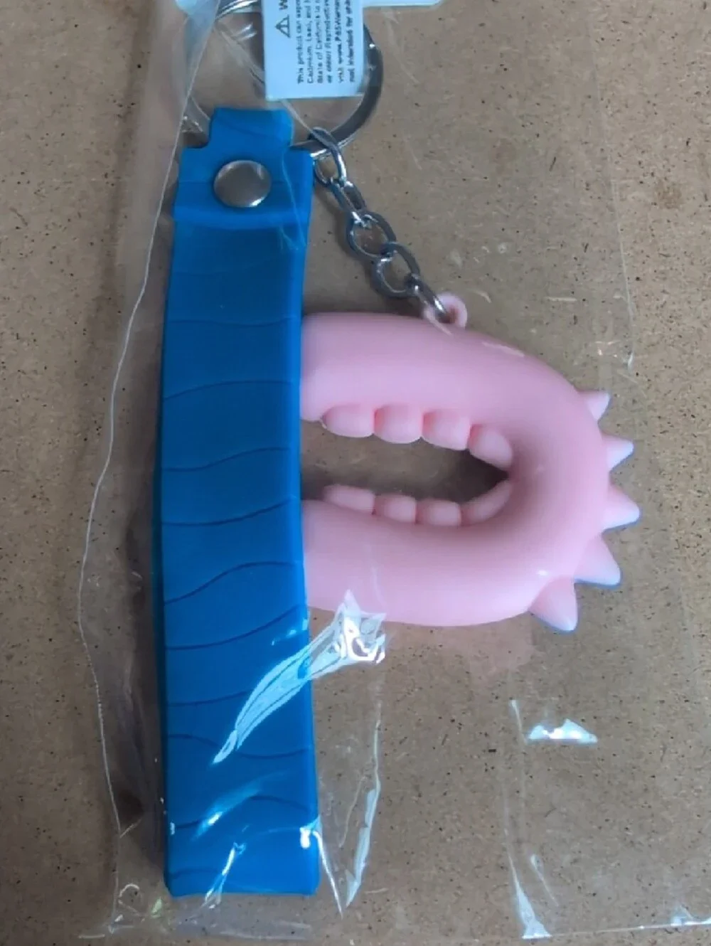 Pink Dino Keychain Charm with Blue 'Good Luck' Strap